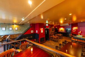 A warm and inviting function room for hire within a charming pub